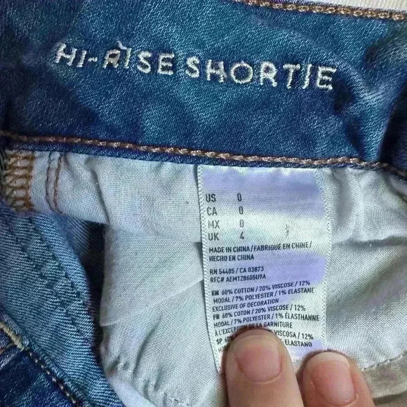 American Eagle Super Stretch Hi-Rise Shortie Denim Raw Hem Cuffed Shorts Size 0 - Picture 3 of 8